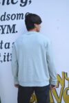 Stay stylish and cozy this winter with our oversized casual sweatshirt. Crafted from high-quality fabric for ultimate comfort and warmth, this blue sweatshirt features a relaxed fit with a classic crew neck design.