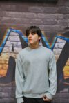 Stay stylish and cozy this winter with our oversized casual sweatshirt. Crafted from high-quality fabric for ultimate comfort and warmth, this blue sweatshirt features a relaxed fit with a classic crew neck design.